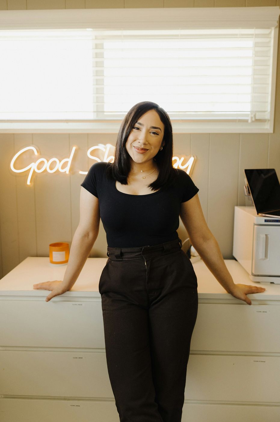 Small business owner standing in her studio