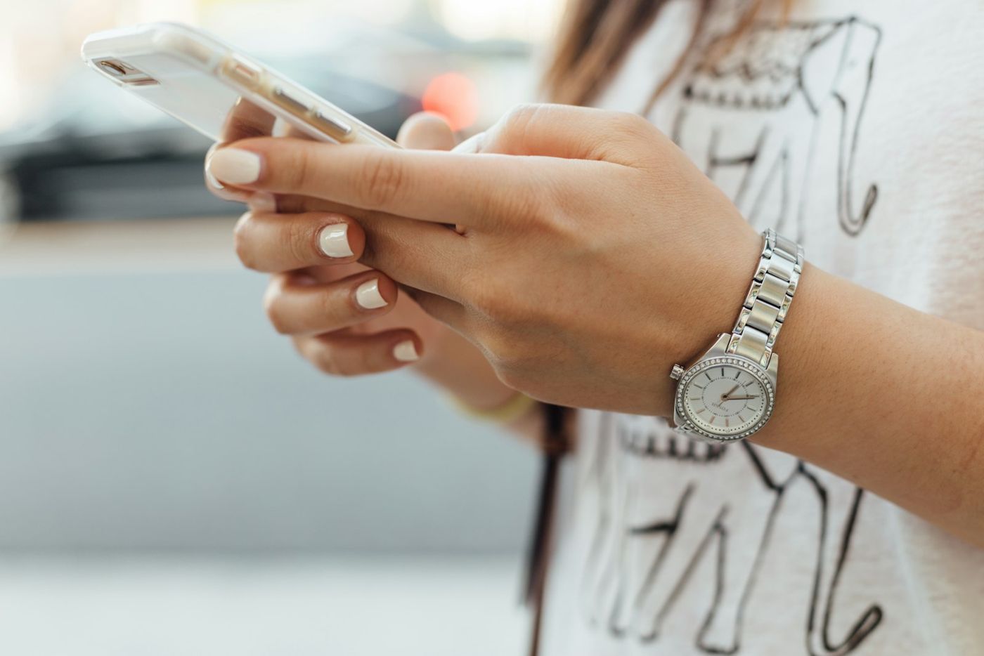 Customer typing a message on a smartphone